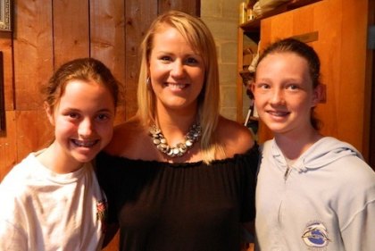 Stacey O"Neal and Sydney Austin pose with Kristy Andrews. They had the honor of introducing her at the presentation.